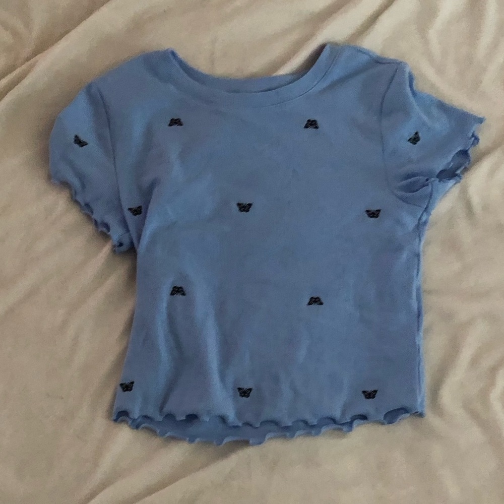 Blue butterfly tee-shirt.